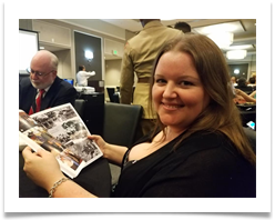 Raqui's Grandaughter Amy Reading the Souvenir Program