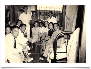 At home of Ador Dionisio in 1946, Ed with ECLGA staff	