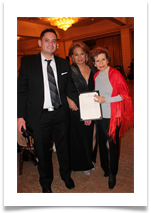 Awee Abayari, VP of Tri Media and her son, C.J. Abayari Puente presenting Raqui with a certificate