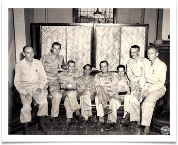 Manila 1945, Ed is 3rd from left, Maj. John Boone is 2nd from right, center is President Manuel Roxas, 1st President of Philippines