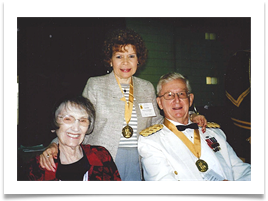 Raqui between Sam and Leslie Myers during the Cavalry Banquet in Fort Reno, OK on Sept. 20, 2014