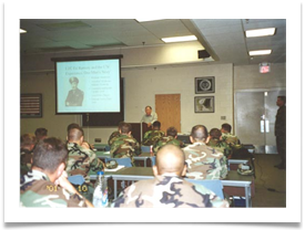 Col. Ramsey giving lecture to Green Berets