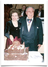 Raqui and Ed Cutting the Cake